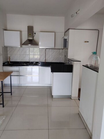 Kitchen in 2 BHK Apartment at Unique Youtopia, Kharadi – for Rent