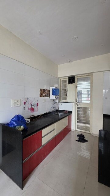 Kitchen in 1 BHK Apartment at Gulmohar Symphony, Kharadi – for Rent