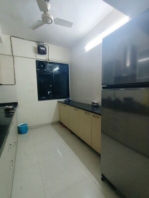 Kitchen in 2 BHK Apartment at Cosmos Horizon, Thane West – for Rent