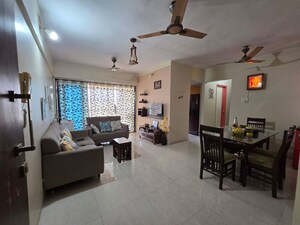Living Room in 2 BHK Apartment at Cosmos Horizon, Thane West – for Rent