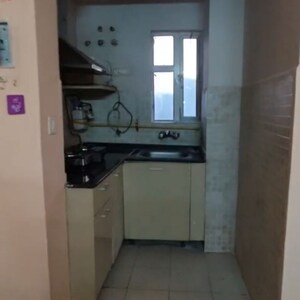 Kitchen in 1 BHK Apartment at Paras Tierea Studio Apartments, Sector 137 – for Sale