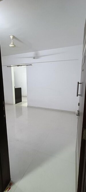 Living Room in 1 BHK Apartment at Kesar Tree Town, Moshi – for Sale