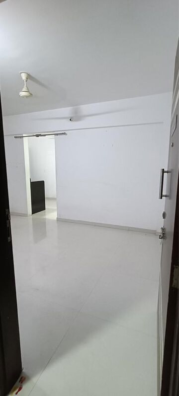 Living Room in 1 BHK Apartment at Kesar Tree Town, Moshi – for Sale