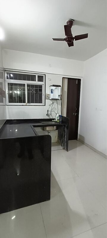 Kitchen in 1 BHK Apartment at Kesar Tree Town, Moshi – for Sale