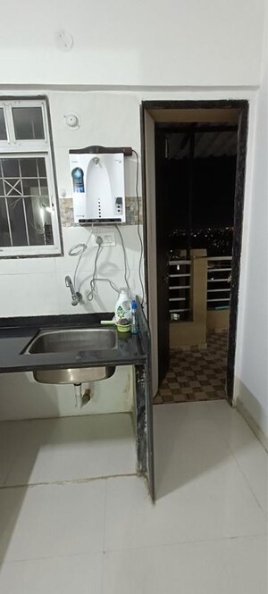 Kitchen in 1 BHK Apartment at Kesar Tree Town, Moshi – for Sale