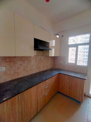 Kitchen in 4 BHK Apartment at Amrapali Crystal Homes, Sector 76 – for Rent