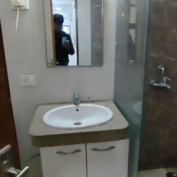 Bathroom in 1 BHK Apartment at Nimbus The Golden Palm, Sector 168 – for Rent