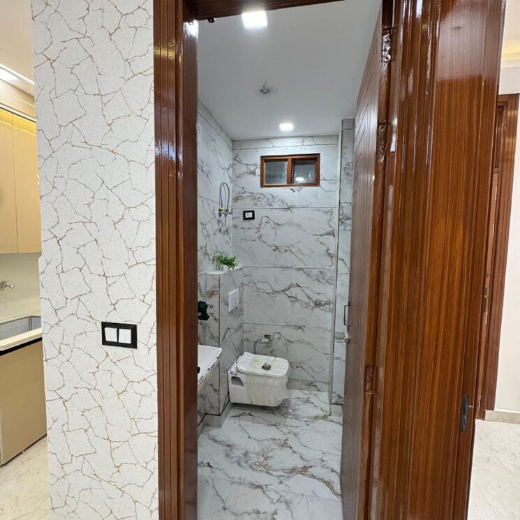 Bathroom, dwarka mor 2 Bedroom 50 Sq.Yd. Builder Floor In Dwarka Mor Delhi 9819752
