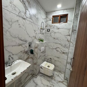 Bathroom in 2 BHK Builder Floor at Dwarka Mor – for Sale