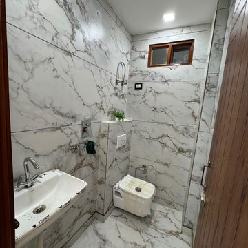 Bathroom in 2 BHK Builder Floor at Dwarka Mor – for Sale