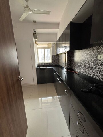 Kitchen in 1.5 BHK Apartment at Lodha Amara, Kolshet Road – for Sale