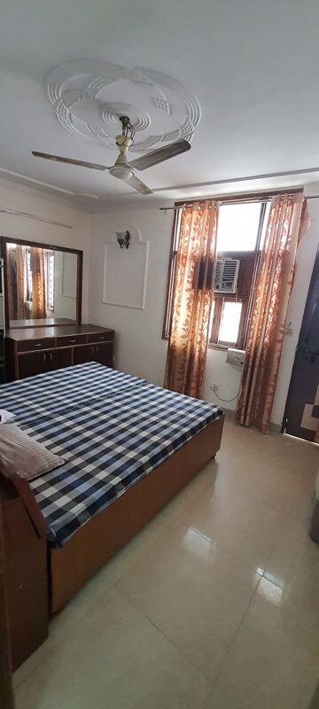 Bedroom in 2 BHK Builder Floor at East Of Kailash – for Rent