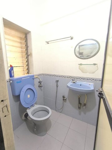 Bathroom in 1 BHK Apartment at Jyoti Castle, Malad West – for Rent