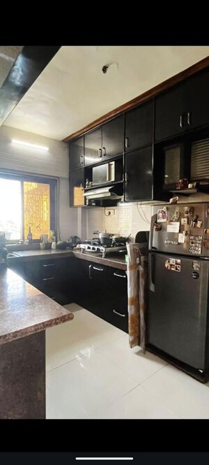 Kitchen in 1 BHK Apartment at Chincholi Apartment, Malad West – for Rent
