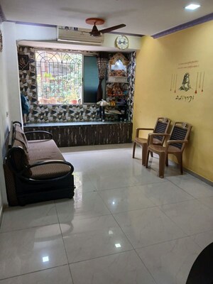Living Room in 1 BHK Apartment at Kopar Khairane Sector 19 – for Sale
