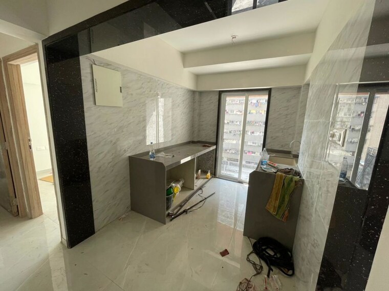 Team Area, sri-zynergy 2 Bedroom 611 Sq.Ft. Apartment In Suman Nagar Mumbai 9819918