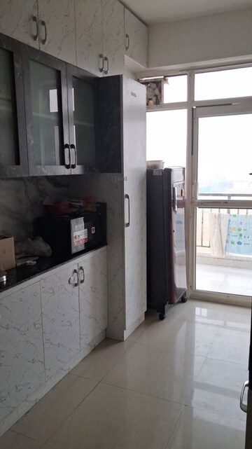Kitchen in 2 BHK Apartment at Suncity Avenue 76, Sector 76 – for Rent