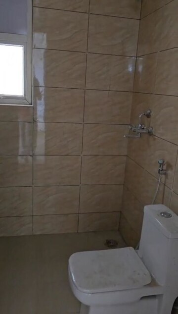 Bathroom in 1 BHK Apartment at Oasis GrandStand, Sector 22d Yamuna Expressway – for Rent