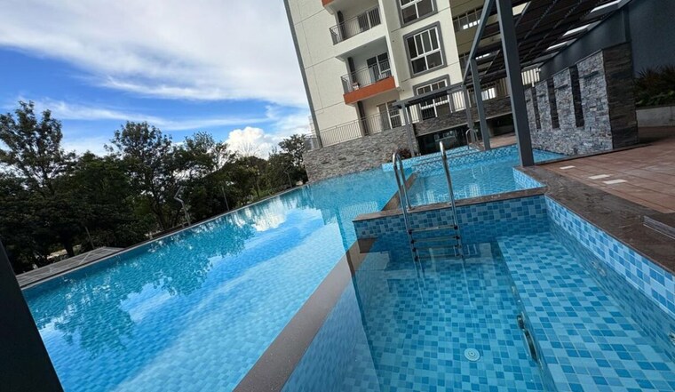 Swimming Pool, disha-pursuit-of-sunshine 2 Bedroom 1230 Sq.Ft. Apartment In Budigere Road Bangalore 9809032