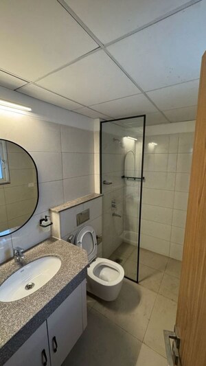 Attached Bathroom in 4 BHK Apartment at Godrej Woods, Sector 43 – for Rent