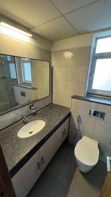 Attached Bathroom in 4 BHK Apartment at Godrej Woods, Sector 43 – for Rent
