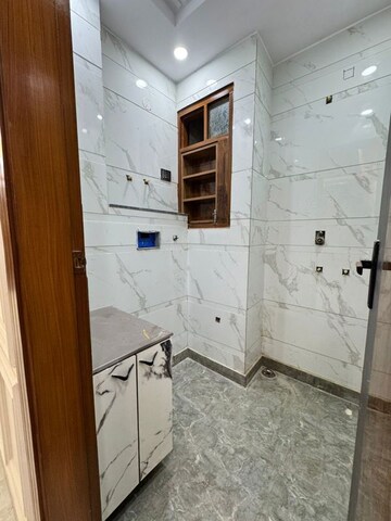 Bathroom in 4 BHK Builder Floor at Dwarka Mor – for Sale
