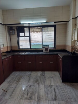 Kitchen in 2 BHK Apartment at Garden Avenue, Nerul Sector 21 – for Rent