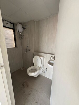 Bathroom in 2 BHK Apartment at Runwal Gardens Phase 2, Dombivli East – for Rent