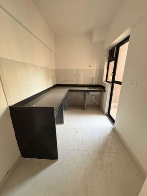 Kitchen in 2 BHK Apartment at Runwal Gardens Phase 2, Dombivli East – for Rent