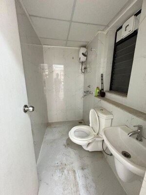 Bathroom in 2 BHK Apartment at Runwal Gardens Phase I, Dombivli East – for Rent