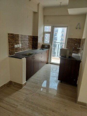 Kitchen in 3 BHK Apartment at Amrapali Terrace Homes, Tech Zone 4 Greater Noida – for Sale