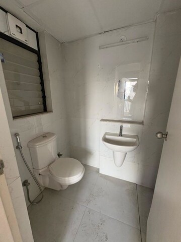 Bathroom in 2 BHK Apartment at Runwal Gardens Phase 2, Dombivli East – for Rent