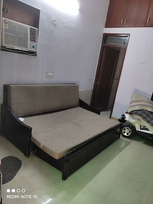 Living Room in 2 BHK Apartment at RWA Jalvayu Vihar, Sector 25 – for Sale