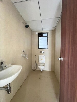 Bathroom in 1 BHK Apartment at Runwal Gardens Phase I, Dombivli East – for Rent