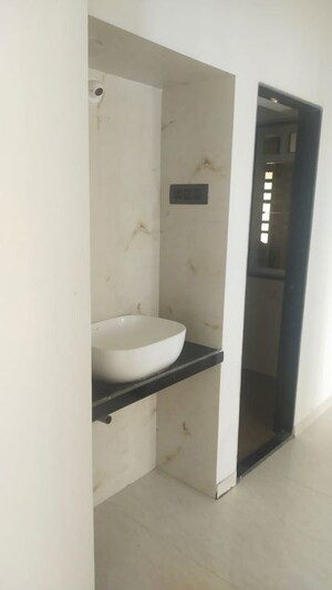 Bathroom in 2 BHK Apartment at Omkar Signet, Malad East – for Rent