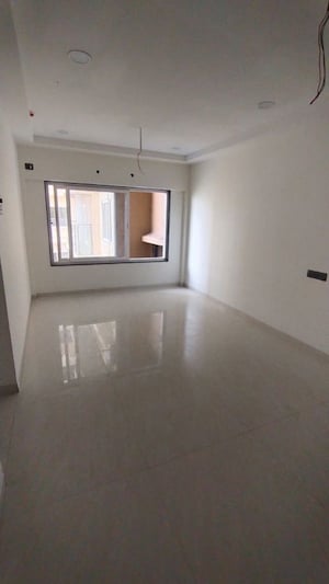 Room in 2 BHK Apartment at Omkar Signet, Malad East – for Rent