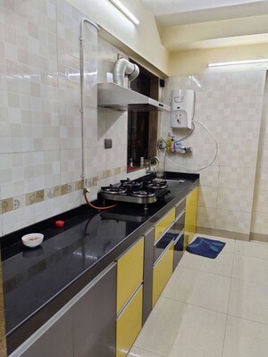 Kitchen in 3 BHK Apartment at Riddhi Tower, Malad East – for Rent