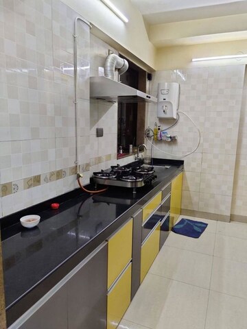 Kitchen in 3 BHK Apartment at Riddhi Tower, Malad East – for Rent