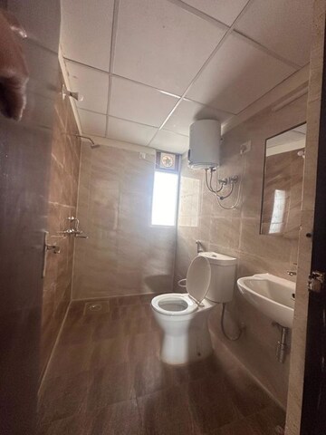 Bathroom in 3 BHK Apartment at Amrapali Crystal Homes, Sector 76 – for Rent