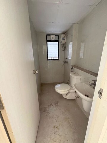 Bathroom in 3 BHK Apartment at Runwal Gardens Phase 2, Dombivli East – for Rent