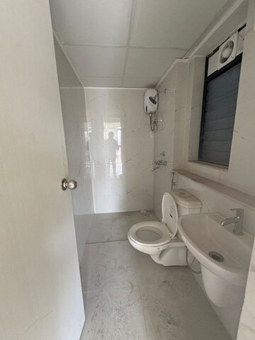Bathroom in 2 BHK Apartment at Runwal Gardens Phase 2, Dombivli East – for Rent