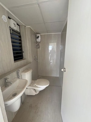 Bathroom in 2 BHK Apartment at Runwal Gardens Phase 2, Dombivli East – for Rent