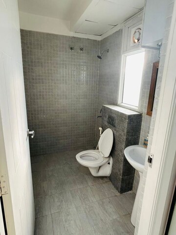 Bathroom in 3 BHK Apartment at Amrapali Crystal Homes, Sector 76 – for Rent