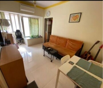 Living Room in 1 BHK Apartment at Mukund CHS Mulund, Mulund East – for Rent
