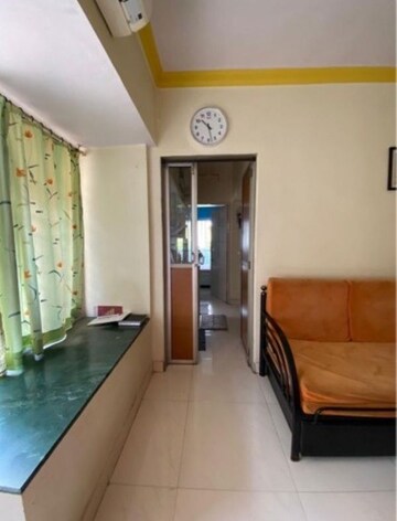 Living Room in 1 BHK Apartment at Mukund CHS Mulund, Mulund East – for Rent