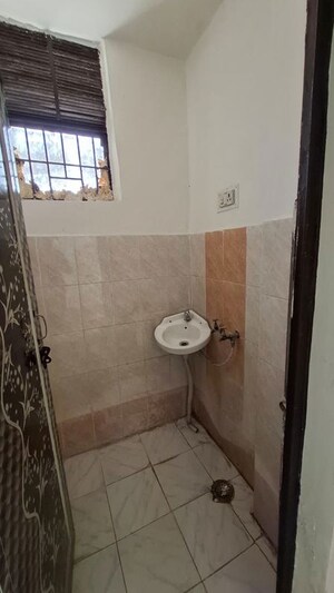 Bathroom in 1.5 BHK Apartment at Sector 10 Greater Noida – for Sale