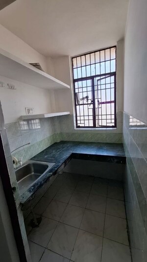 Kitchen in 1.5 BHK Apartment at Sector 10 Greater Noida – for Sale