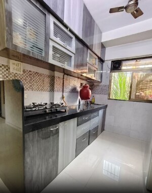 Kitchen in 1 BHK Apartment at Medha CHS, Kandivali West – for Sale