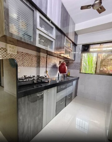 Kitchen in 1 BHK Apartment at Medha CHS, Kandivali West – for Sale