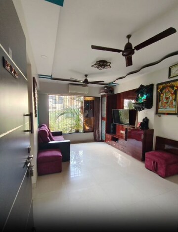 Living Room in 1 BHK Apartment at Medha CHS, Kandivali West – for Sale